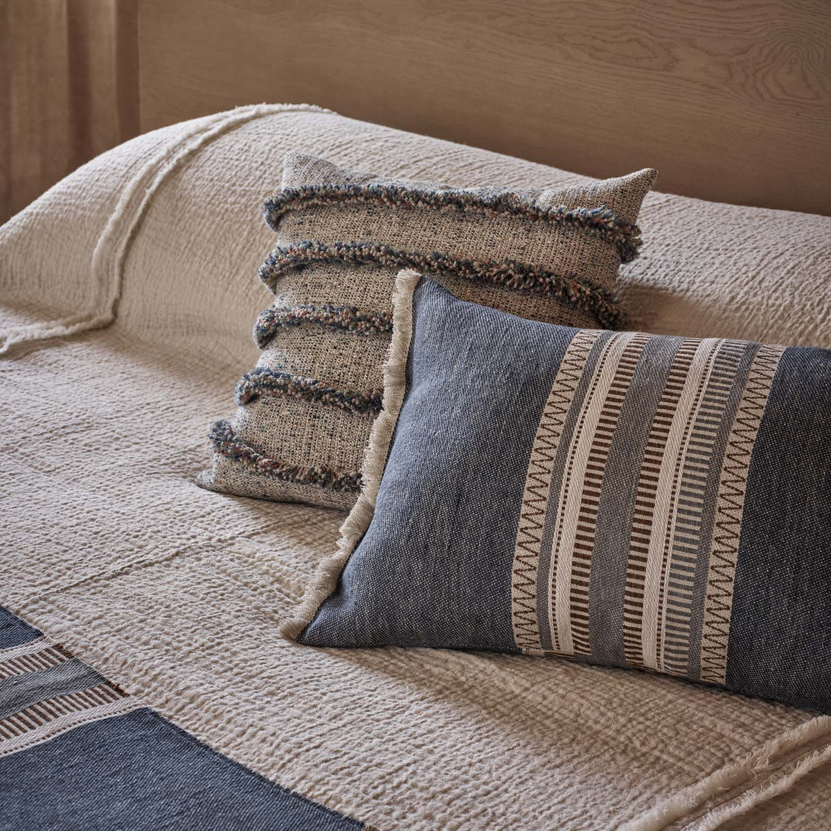 de Le Cuona Striped Linen Cushion – Juniper, room setting 2