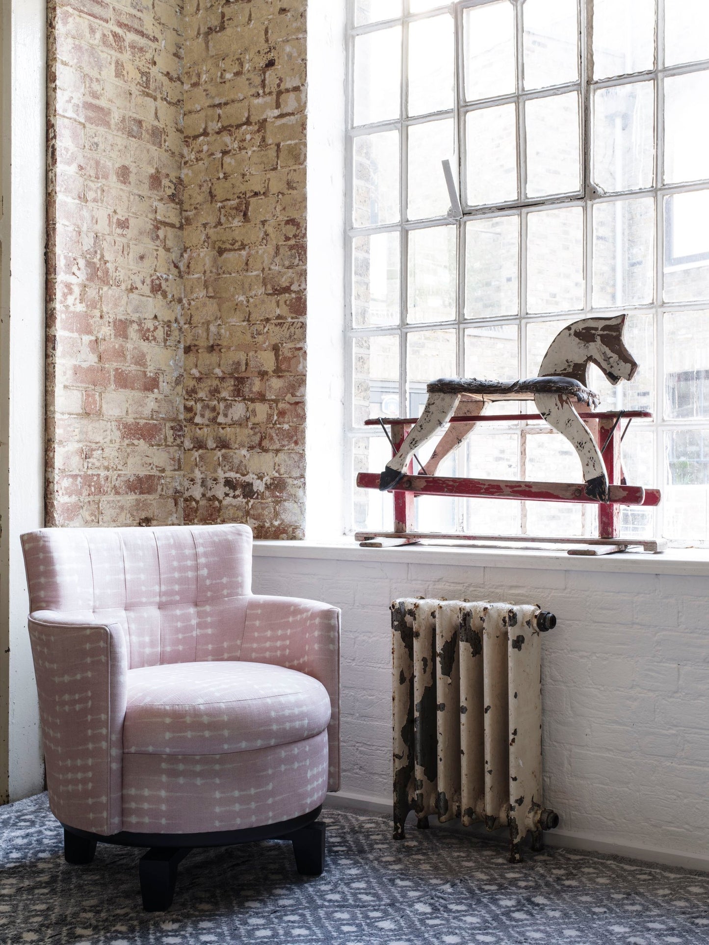 Andrew Martin Freya Swivel Chair in Coco Pink