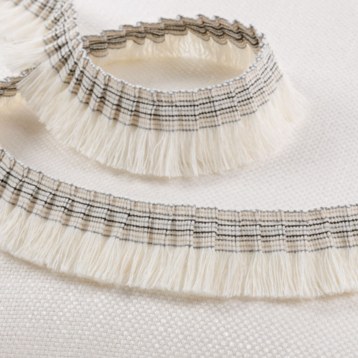 ROMO | Jacuba Trimmings | Tambor Fringe