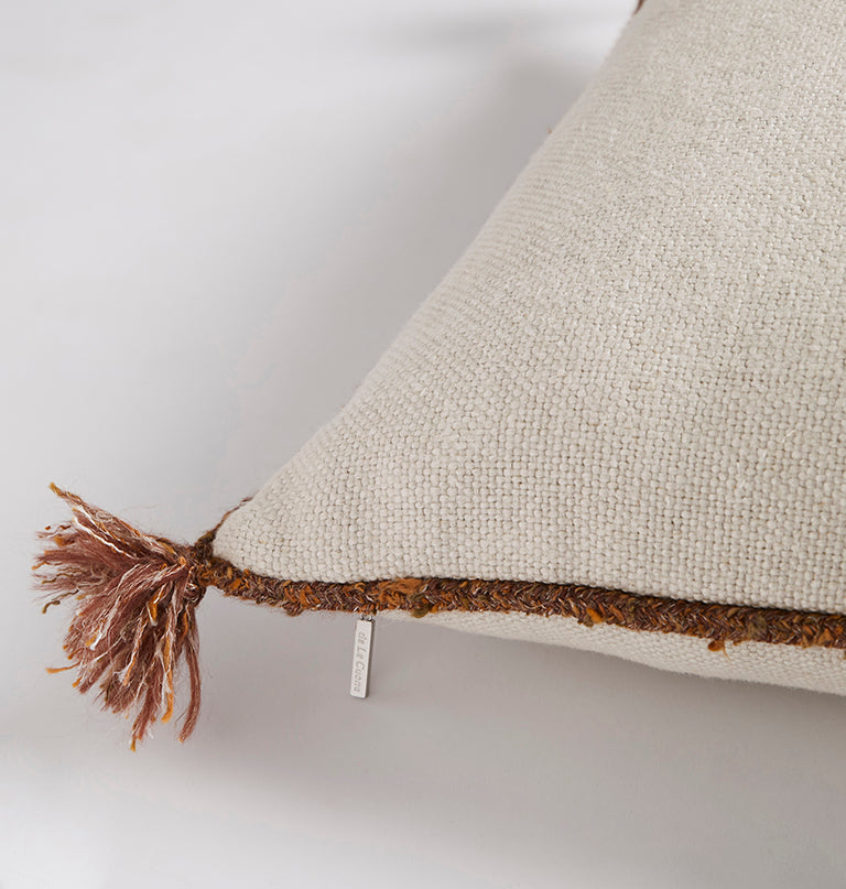 de Le Cuona | Cape Cushion with Braided Cord Trim – Frost