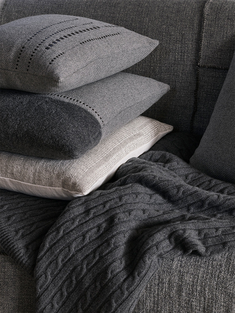 de Le Cuona | Warrior Cloth Panelled Throw with Fringe & Cord – Cave