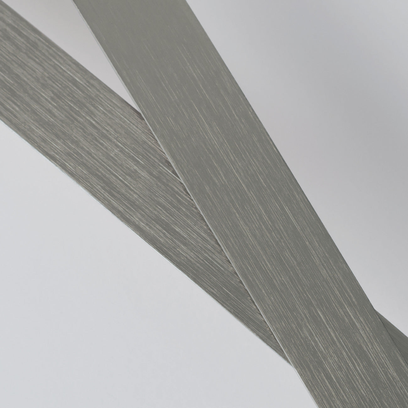 Elitis | Profilé aluminium Brosse Argent foncé Roll - 91 - Aluminium brossé Argent foncé (bobine 20m / roll 20m)